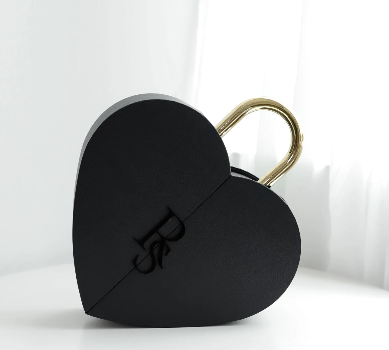 Heart-shaped box filled with red preserved